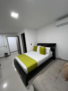 Voodi või voodid majutusasutuse Hotel Granada Suites - AV 9 toas