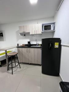 Köök või kööginurk majutusasutuses Hotel Granada Suites - AV 9