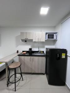 Köök või kööginurk majutusasutuses Hotel Granada Suites - AV 9