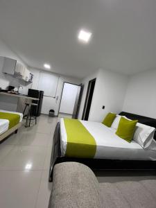Voodi või voodid majutusasutuse Hotel Granada Suites - AV 9 toas