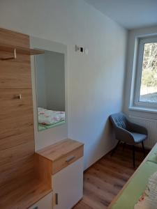 Postel nebo postele na pokoji v ubytování Appartements Dorner, Semmering