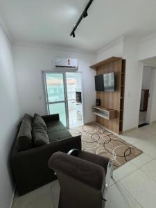 TV a/nebo společenská místnost v ubytování Residencial Portinari