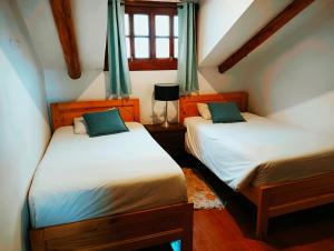 Postel nebo postele na pokoji v ubytování Illa B&B