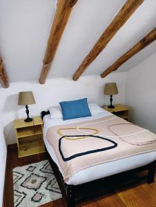 Postel nebo postele na pokoji v ubytování Illa B&B