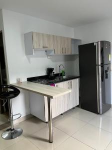 Köök või kööginurk majutusasutuses Hotel Granada Suites - AV 9