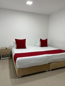 Voodi või voodid majutusasutuse Hotel Granada Suites - AV 9 toas