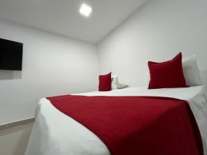 Voodi või voodid majutusasutuse Hotel Granada Suites - AV 9 toas