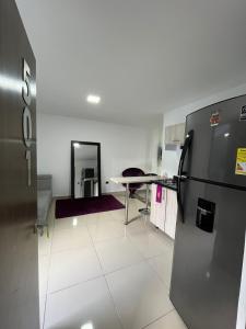 Köök või kööginurk majutusasutuses Hotel Granada Suites - AV 9