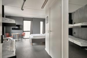 Four Points Flex by Sheraton Copenhagen Arena房間的床