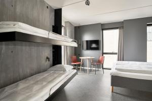 Four Points Flex by Sheraton Copenhagen Arena房間的床