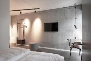 Four Points Flex by Sheraton Copenhagen Arena房間的床