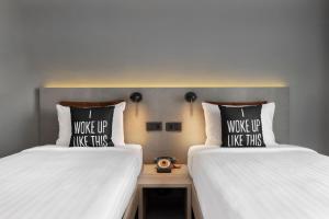 Posteľ alebo postele v izbe v ubytovaní Moxy Barcelona