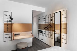 Posteľ alebo postele v izbe v ubytovaní Moxy Barcelona