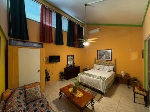 A bed or beds in a room at Shalom Suite 2, Manor Park