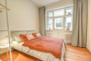 Postel nebo postele na pokoji v ubytování Apartmán se 2 ložnicemi