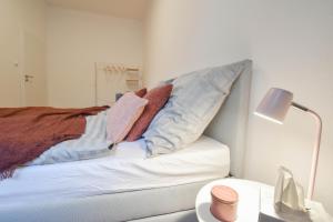 Postel nebo postele na pokoji v ubytování Apartmán se 2 ložnicemi