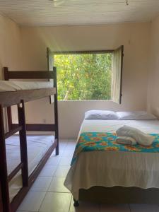 Postel nebo postele na pokoji v ubytování Alecrim Hostel e Pousada