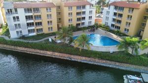 Hồ bơi trong/gần APARTAMENTO Lujo Lecheria 2 HAB 2 BAÑOS 7 PERSONAS-Planta Electrica