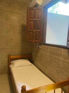 Postel nebo postele na pokoji v ubytování Alecrim Hostel e Pousada