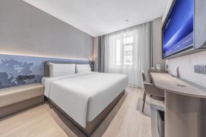 Televizors / izklaižu centrs naktsmītnē Atour Light Hotel Chengdu Yulin Street Nijia Bridge