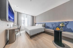 Gulta vai gultas numurā naktsmītnē Atour Light Hotel Chengdu Yulin Street Nijia Bridge