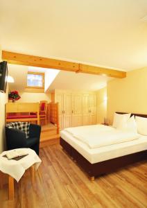 Postel nebo postele na pokoji v ubytování Hotel Sperlhof