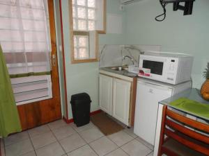 Kuchyň nebo kuchyňský kout v ubytování Smart-lidays'mini-dorm