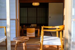 Posezení v ubytování 岡山楽禅庵 Raku-Zen-An 岡山門田文化町の隠れ高級旅館 静寂と四季の彩りに包まれる優雅な滞在 無料駐車場有り supported by COCOSTAY