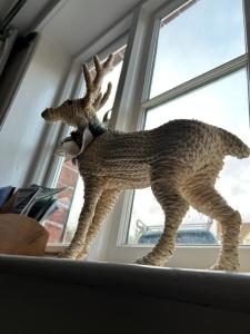 a statue of a dog holding a child on its back at Grade 2 Cottage 1 bedroom, Ludlow centre in Ludlow