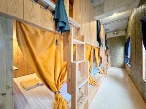 Μία ή περισσότερες κουκέτες σε δωμάτιο στο Guesthouse Asibina +126 φωτογραφίες