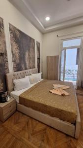 Postel nebo postele na pokoji v ubytování downtown Family Suites