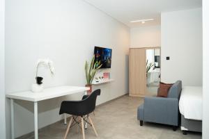TV a/nebo společenská místnost v ubytování Studio 27 Sanur