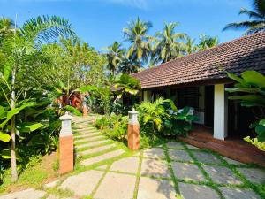 Afbeelding uit fotogalerij van Hotel Holiday Home in Kovalam