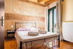 Postel nebo postele na pokoji v ubytování Traditional Venetian Stone House