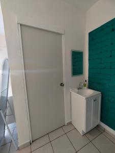 Et tv og/eller underholdning på Casa Pax - Habitación el Oasis Secreto Frente al Mar