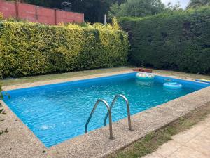 Φωτογραφία από το άλμπουμ του Casa Pingueral estufa - piscina - cercano a playa σε Dichato