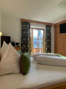 Letto o letti in una camera di Badererhof Christine Wechselberger