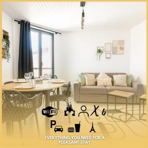 a living room with a couch and a table at Le 27 - Appartement Cosy - Disney 15min in Crecy la Chapelle