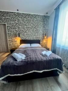 Llit o llits en una habitació de Royal Galaxy 9 fotos més