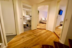 a view of a living room from the hallway at Maisonette-Loft in Nähe zum Dom in Cologne