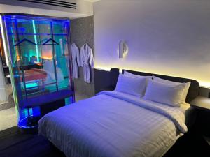Letto o letti in una camera di CapsuleTransit MAX - Airport Hotel - Landside, Public Area - Gateway KLIA T2, Lvl 2M