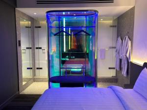 Letto o letti in una camera di CapsuleTransit MAX - Airport Hotel - Landside, Public Area - Gateway KLIA T2, Lvl 2M