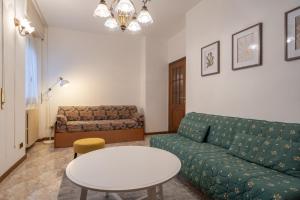 Posezení v ubytování Garden - residence in the center of Barzio