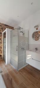 a bathroom with a shower and a glass door at Bellavista Room Bakio in Bakio