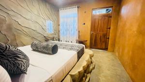 Postel nebo postele na pokoji v ubytování Shan Home Stay Sigiriya + 37 fotografií