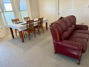 Un lugar para sentarse en U4A ensuite room