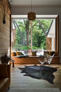 Część wypoczynkowa w obiekcie Villa Forêt et Spa