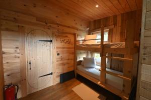 Łóżko lub łóżka w pokoju w obiekcie Villa Forêt et Spa