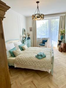 Postel nebo postele na pokoji v ubytování Wonderland Brno