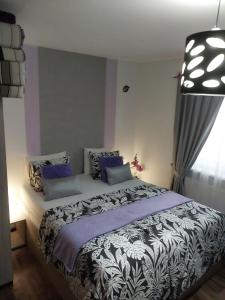 Ένα ή περισσότερα κρεβάτια σε δωμάτιο στο Apartmány Freesia